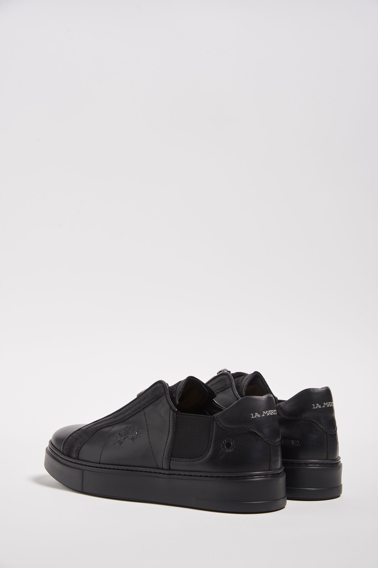 Leather shoes featuring a black crepe sole